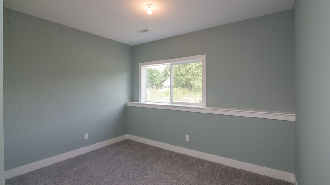 Representative unfurnished interior of a home built from the The Hartland by Norfolk Homes in Coronado Estates, Jackson (Image 65).