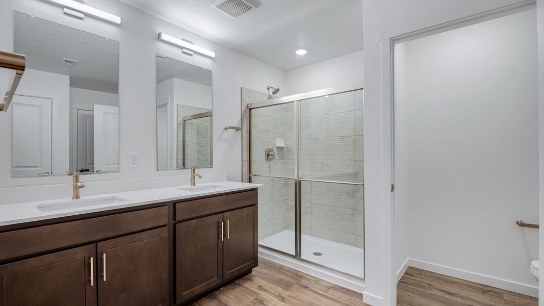 Furnished interior view inside a new home in Trails at Crowfoot, Parker (Image 16).