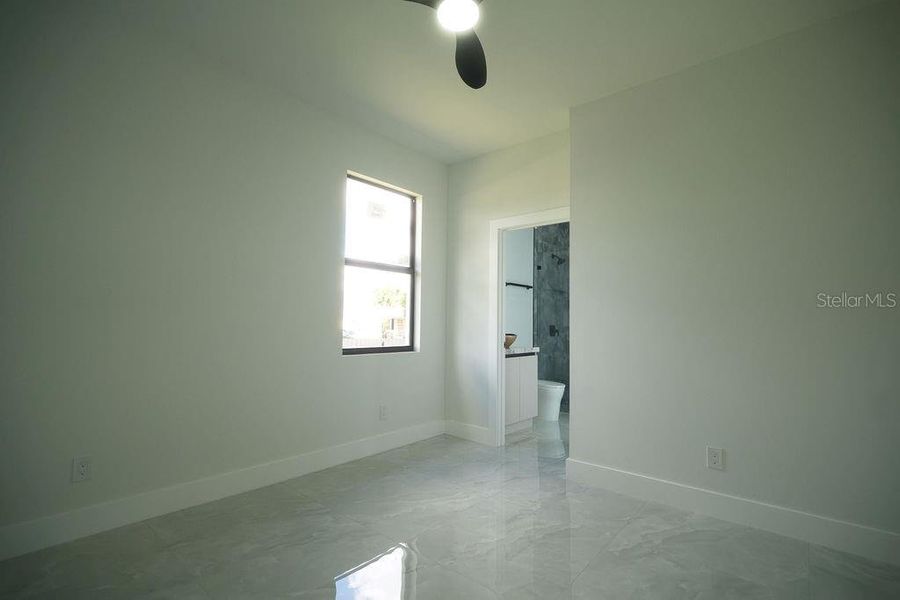 Spacious, unfurnished interior of a new home in , Port Charlotte (Image 34).
