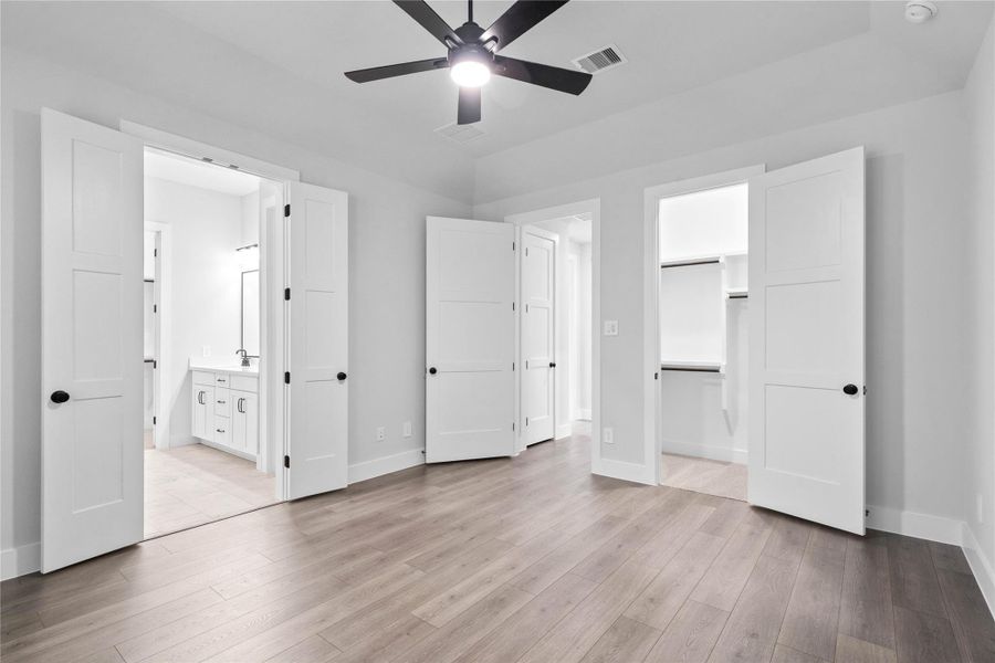 The private primary suite efficiently connects the sleeping area with the dedicated bathroom and a generous closet. Primary bedroom suite features 2 generous closets. The private primary suite efficiently connects the sleeping area with the dedicated bathroom and a generous closet. Primary bedroom suite features 2 generous closets.