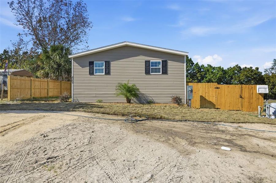 Exterior details and patio area of a home in , Brooksville (Image 25).
