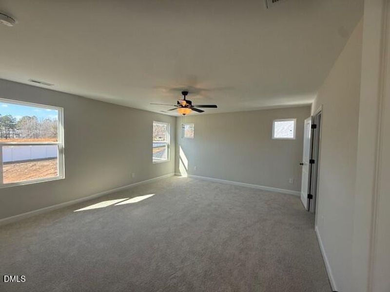 Spacious, unfurnished interior of a new home in Woodland Crossing, Zebulon (Image 12).