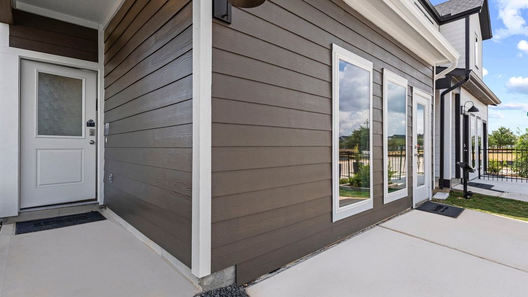 Exterior details and patio area of a home in Villarosa at Tamarron, Katy (Image 2). Exterior details and patio area of a home in Villarosa at Tamarron, Katy (Image 2).