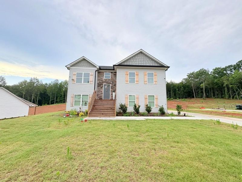 Front exterior of a new home in , Clarkesville, GA, highlighting curb appeal (Image 17).