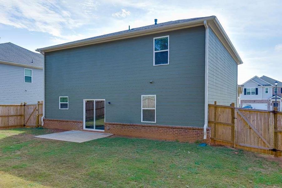 Exterior details and patio area of a home in , Loganville (Image 2). Exterior details and patio area of a home in , Loganville (Image 2).