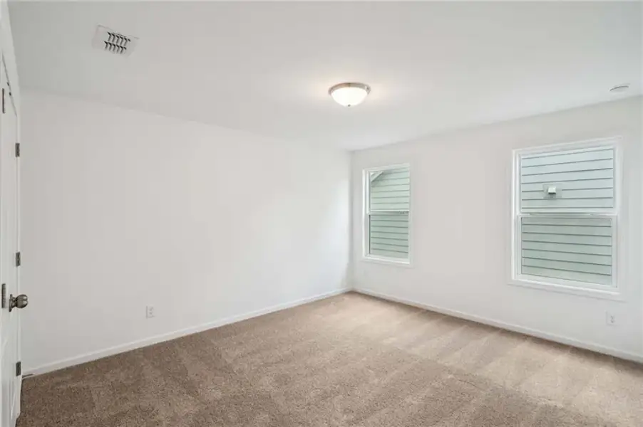 Spacious, unfurnished interior of a new home in Eastlyn Crossing, Flowery Branch (Image 26). Spacious, unfurnished interior of a new home in Eastlyn Crossing, Flowery Branch (Image 26).