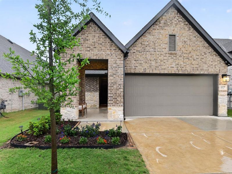 Front exterior of a new home in , Royse City, TX, highlighting curb appeal (Image 2). Front exterior of a new home in , Royse City, TX, highlighting curb appeal (Image 2).