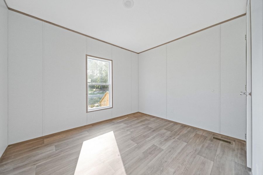 Spacious, unfurnished interior of a new home in , St. Matthews (Image 11).