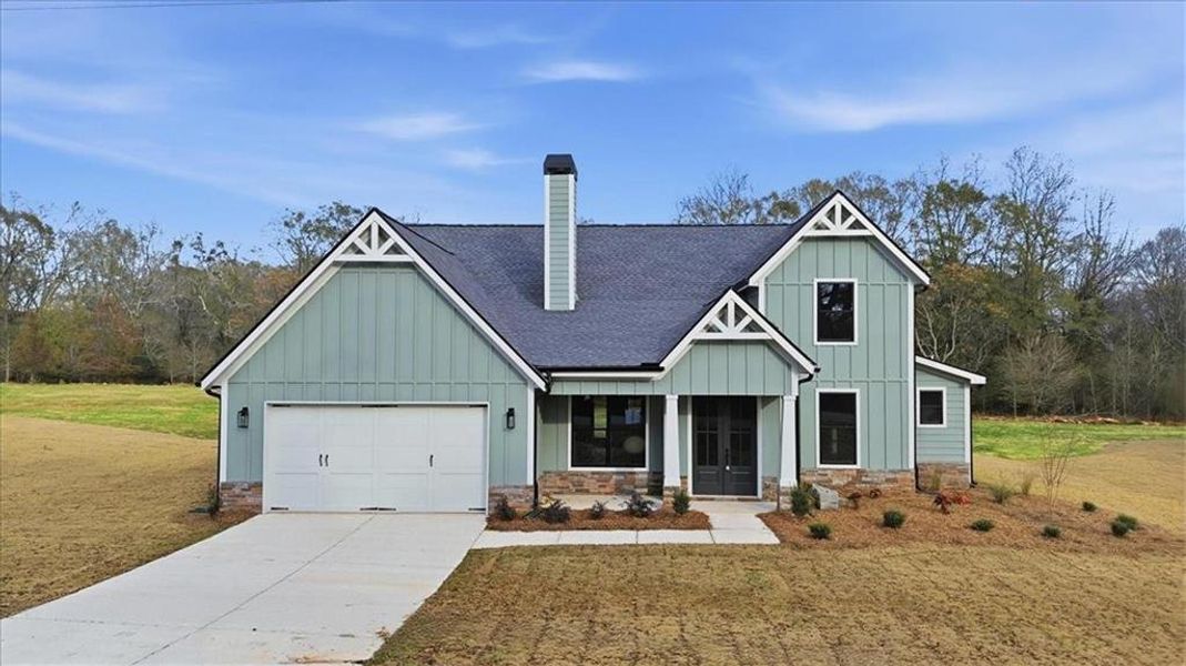 Front exterior of a new home in , Statham, GA, highlighting curb appeal (Image 32).