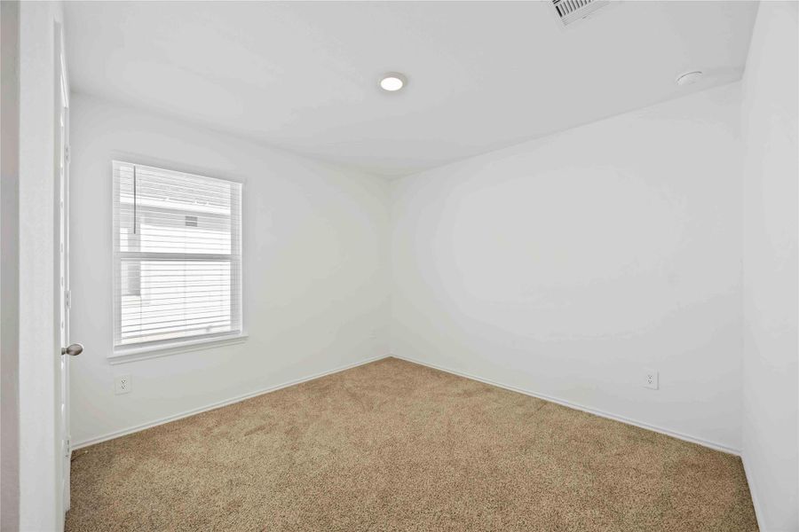 Spacious, unfurnished interior of a new home in Tamarron, Fulshear (Image 29).