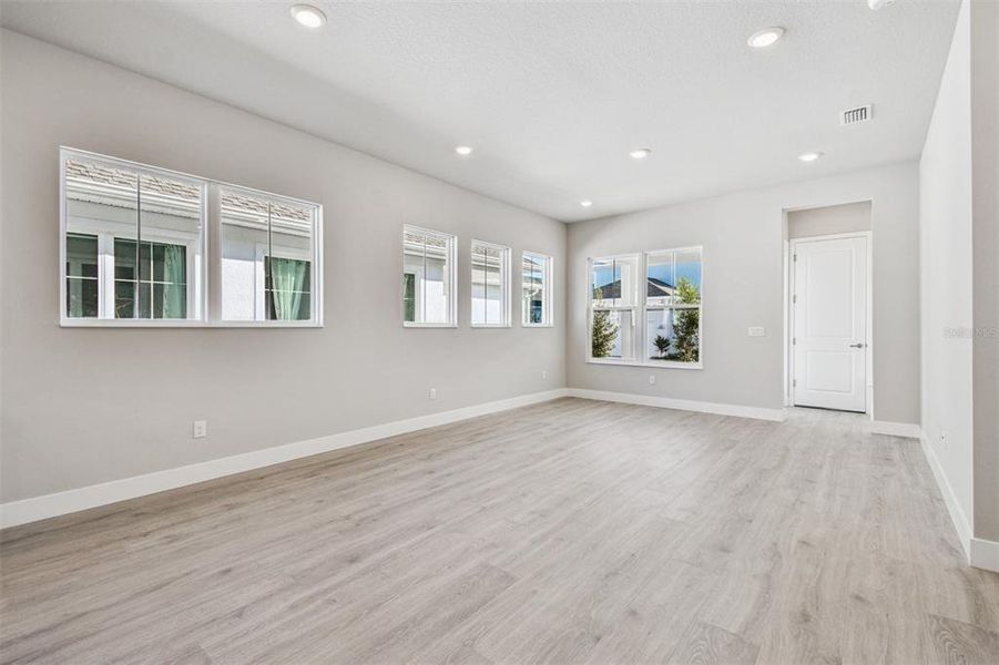 Spacious, unfurnished interior of a new home in Emerald Landing at Waterside at Lakewood Ranch – Cottage Series, Sarasota (Image 23). Spacious, unfurnished interior of a new home in Emerald Landing at Waterside at Lakewood Ranch – Cottage Series, Sarasota (Image 23).