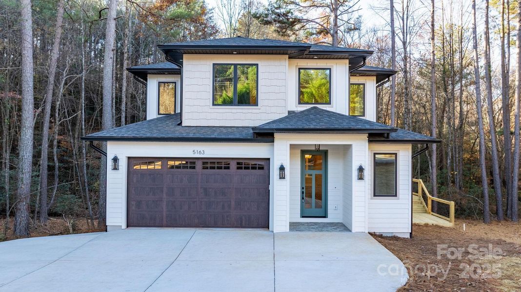 Front exterior of a new home in , Granite Falls, NC, highlighting curb appeal (Image 1).