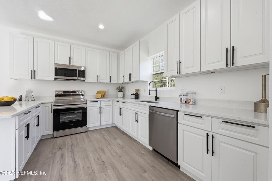 Furnished interior view inside a new home in , Orange Park (Image 36).