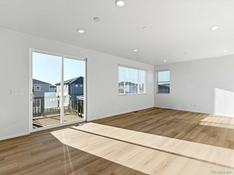 Spacious, unfurnished interior of a new home in Buffalo Highlands: The Flora Collection, Commerce City (Image 14).