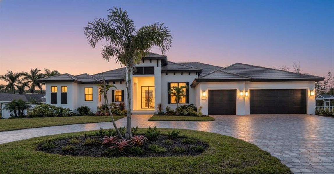 Front exterior of a new home in , Sarasota, FL, highlighting curb appeal (Image 27).