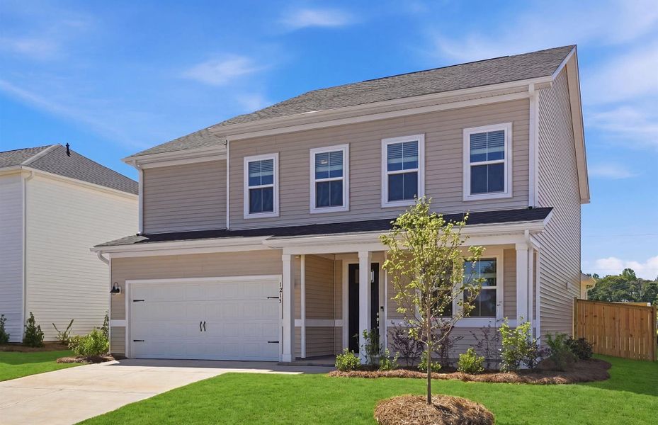Front exterior of a new home in Fox Hollow, Spartanburg, SC, highlighting curb appeal (Image 2). Front exterior of a new home in Fox Hollow, Spartanburg, SC, highlighting curb appeal (Image 2).