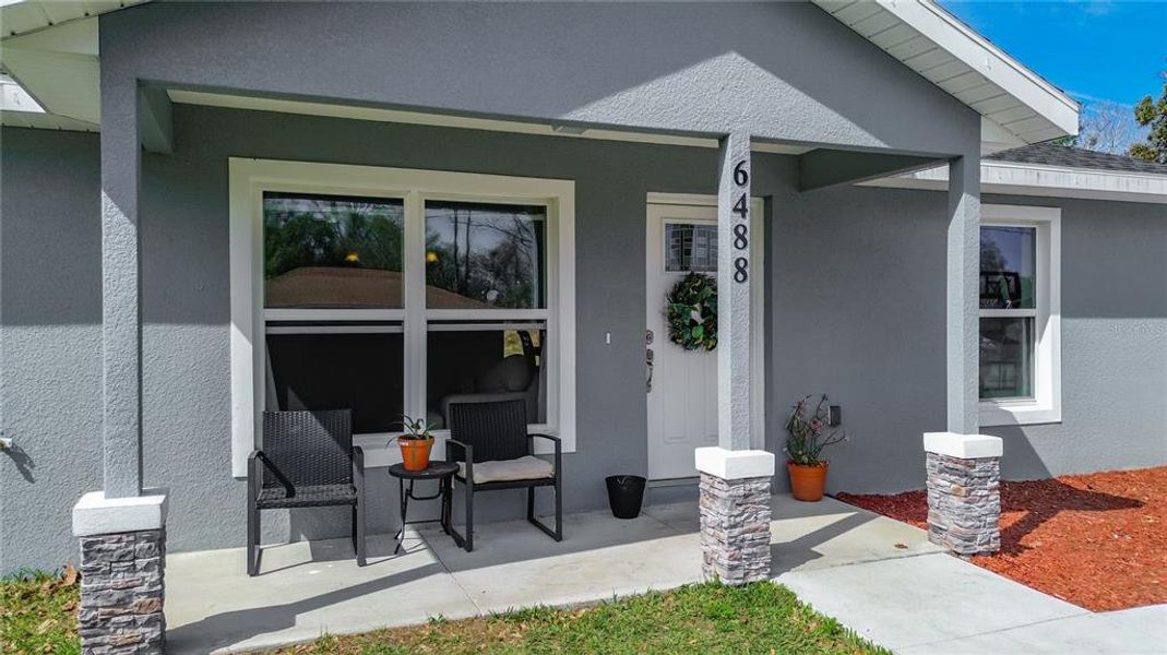 Exterior details and patio area of a home in , Ocala (Image 4).
