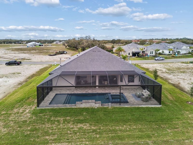 Exterior details and patio area of a home in River Preserve Estates, Parrish (Image 45).