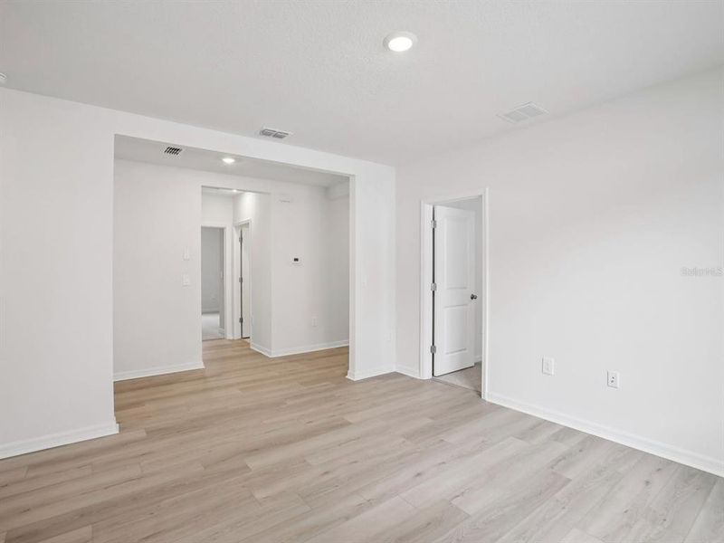 Spacious, unfurnished interior of a new home in The Grove at Stuart Crossing - Classic Series, Bartow (Image 14).