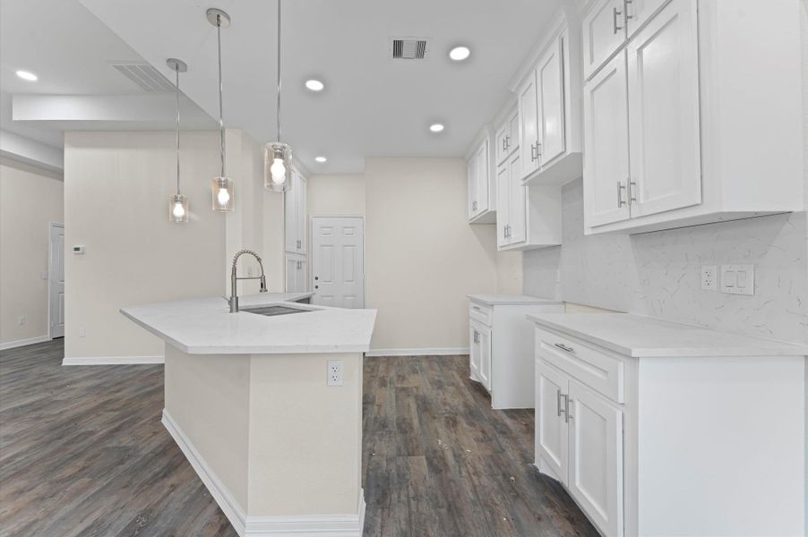 Cabinets are soft closing and go all the way to the ceiling