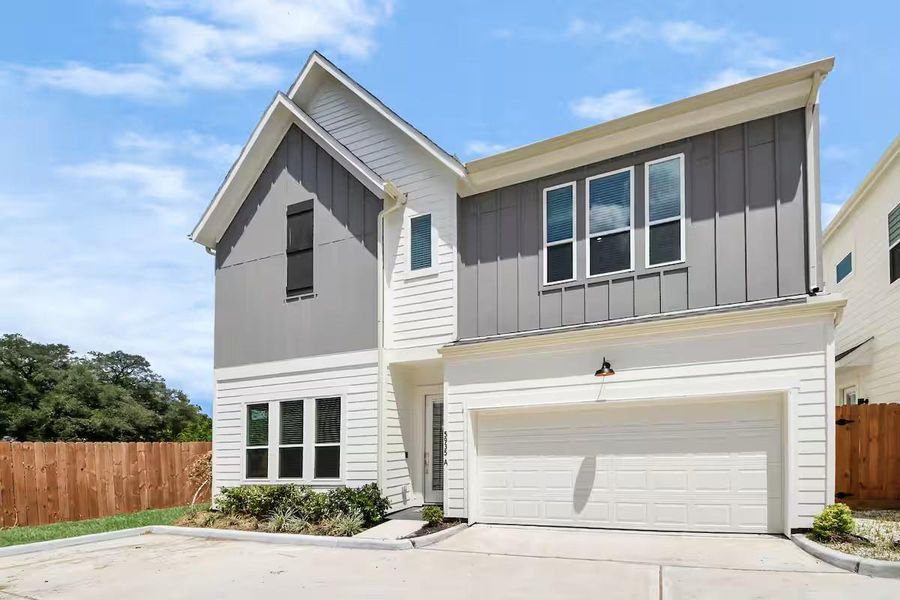 Front exterior of a new home in , Houston, TX, highlighting curb appeal (Image 20).