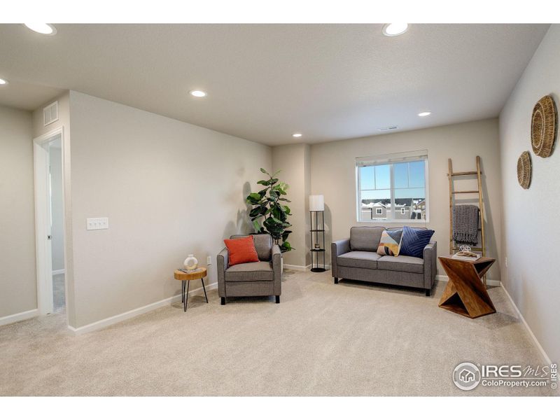 Large upstairs loft greets you at the top of the stairs