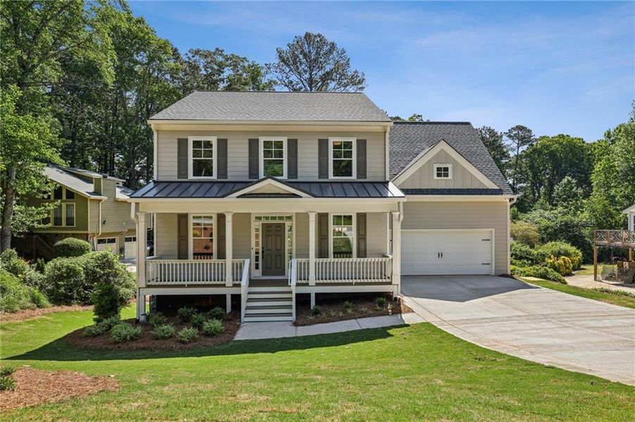 Front exterior of a new home in , Smyrna, GA, highlighting curb appeal (Image 1). Front exterior of a new home in , Smyrna, GA, highlighting curb appeal (Image 1).