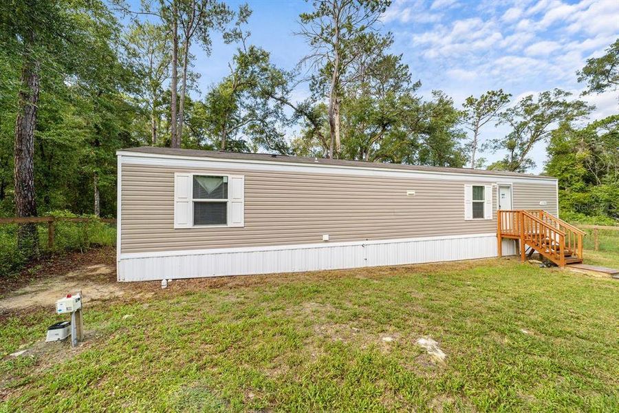 Exterior details and patio area of a home in , Ocala (Image 25).