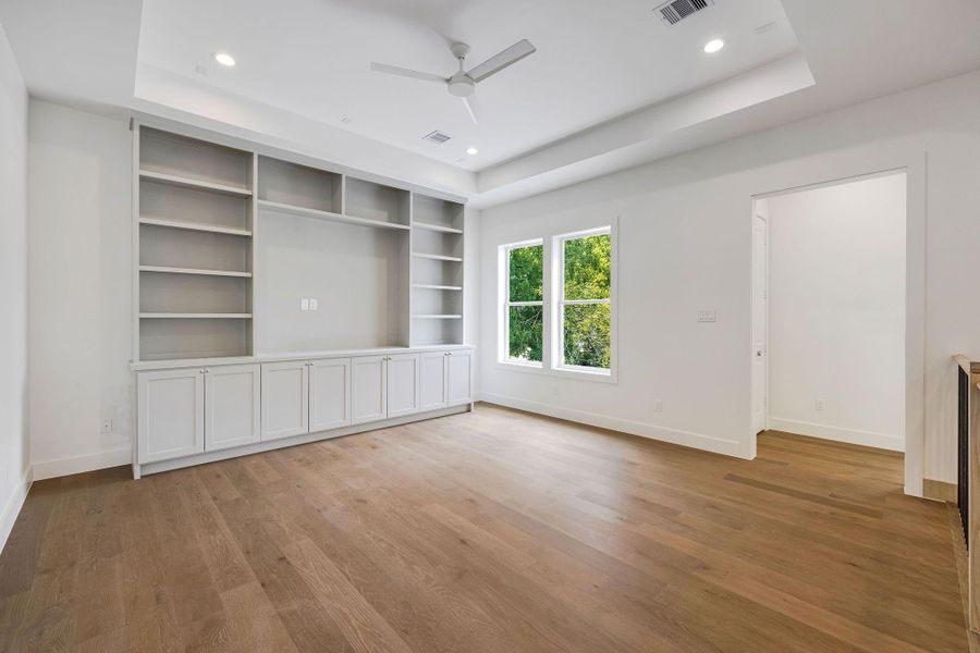 Upstairs, the sizable game room with custom built-ins provides an ideal space for relaxation or play. Upstairs, the sizable game room with custom built-ins provides an ideal space for relaxation or play.