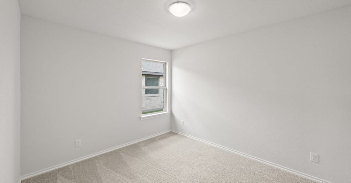 Representative exterior photo of a completed home built from the Lincoln by Impression Homes in Baker Farms, Cleburne, TX (Image 22).