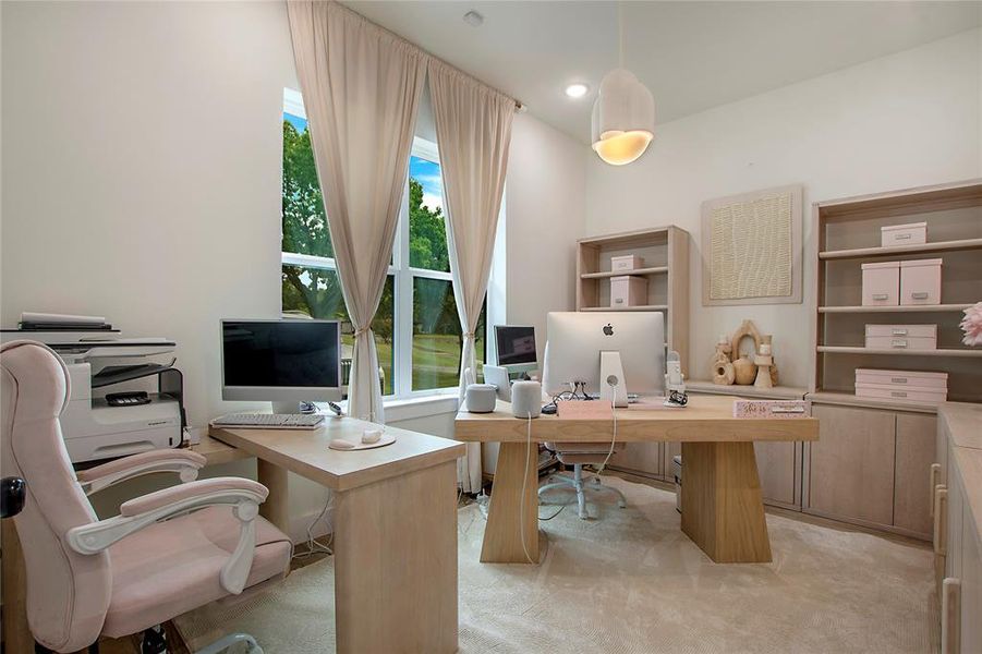 Home office with light colored carpet Home office with light colored carpet