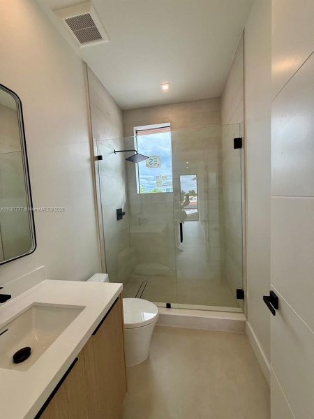 Furnished interior view inside a new home in , Surfside (Image 12).