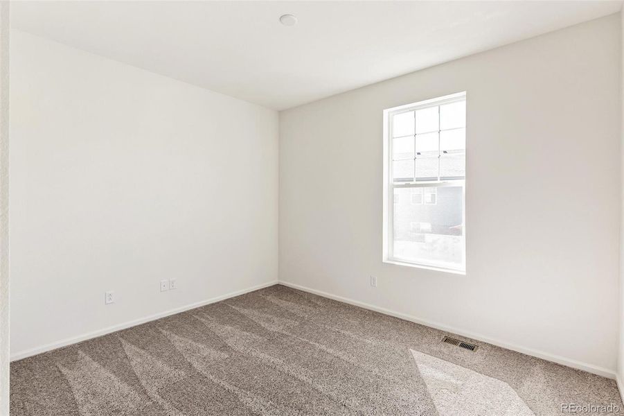 Spacious, unfurnished interior of a new home in Terrain Oak Valley, Castle Rock (Image 28).