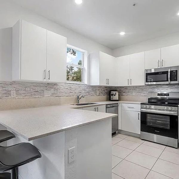 Furnished interior view inside a new home in , Lauderhill (Image 5).