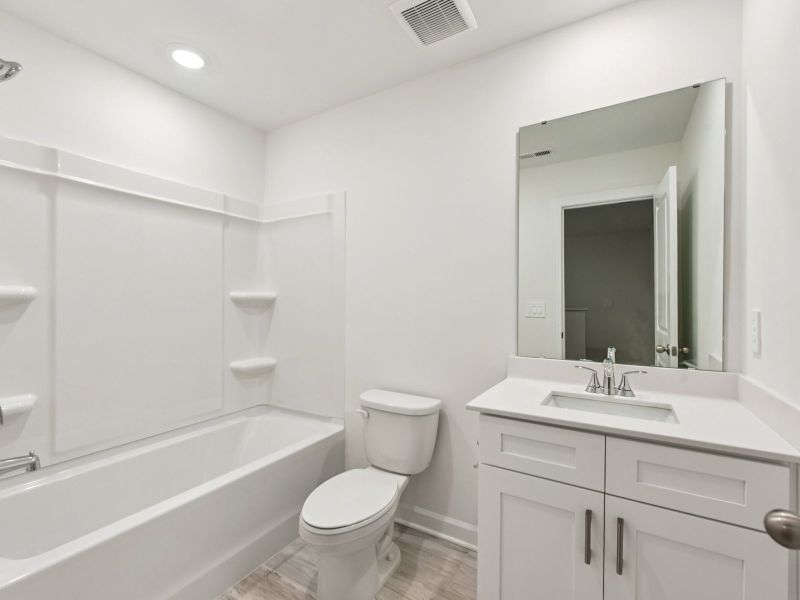 Furnished interior view inside a new home in Rocky River Towns, Charlotte (Image 6).