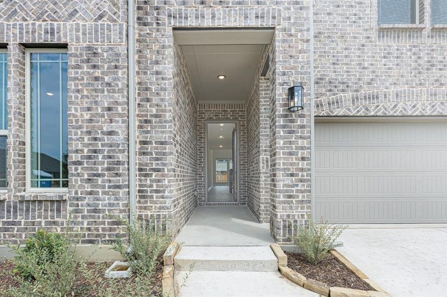 Exterior details and patio area of a home in Creekview Meadows, Pilot Point (Image 4). Exterior details and patio area of a home in Creekview Meadows, Pilot Point (Image 4).