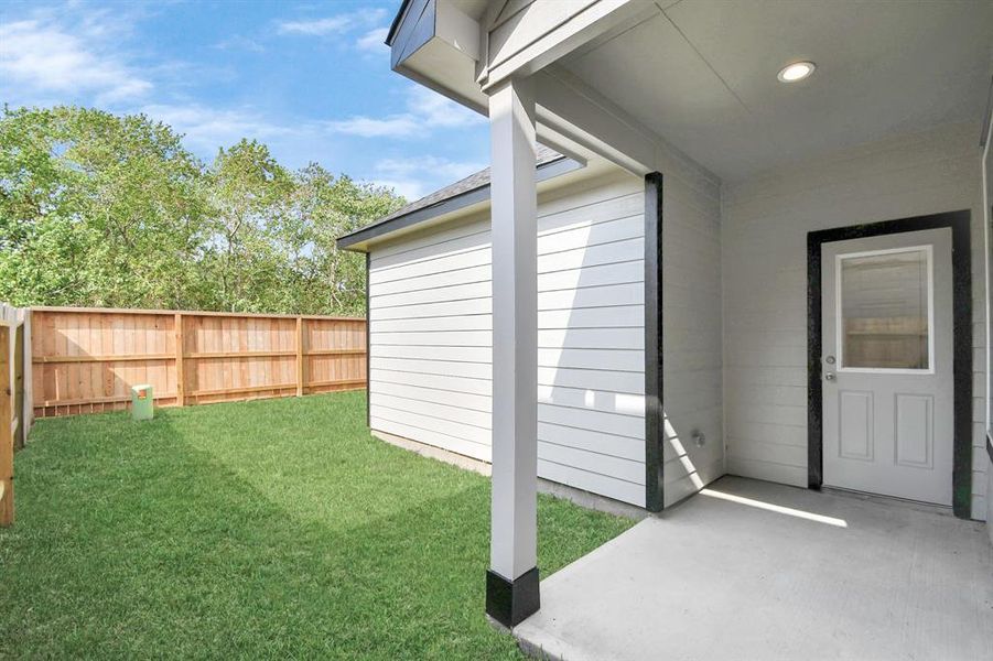 Step into a world of outdoor possibilities with this remarkable backyard and its charming covered patio. From playtime for the kids to relaxation for the adults, this space offers the best of both worlds. Customize it with patio furniture, a BBQ pit, and more, turning it into the ultimate outdoor retreat that suits your lifestyle.