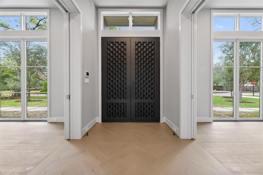 Home features a customized double iron entry door, adding a unique and elegant touch to the property's entrance. Home features a customized double iron entry door, adding a unique and elegant touch to the property's entrance.