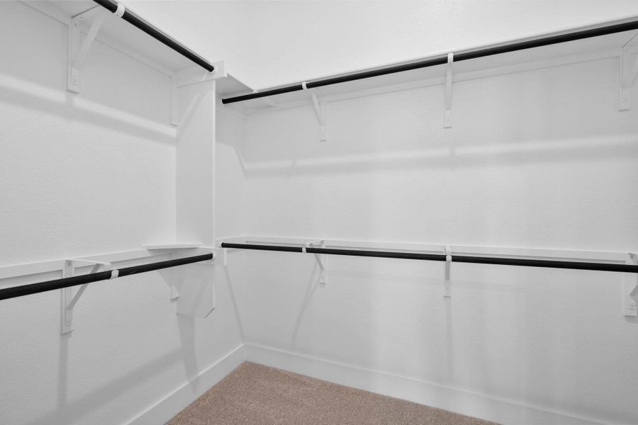 Walk-in closet in Primary Bedroom