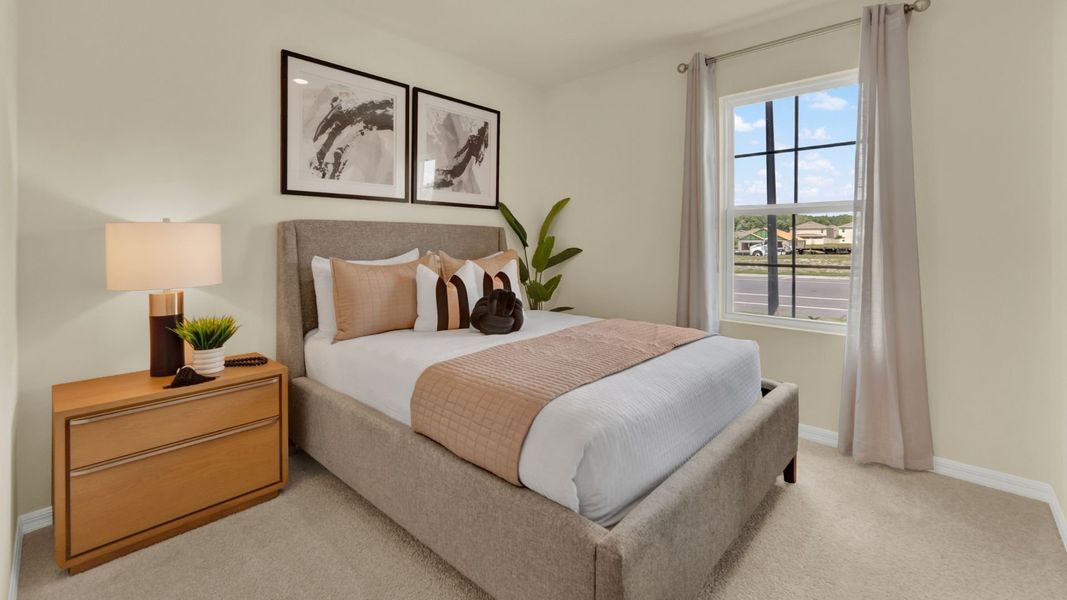 Representative furnished interior of a home built from the Baldwin by D.R. Horton in Crossroads at Kelly Park, Apopka (Image 12).