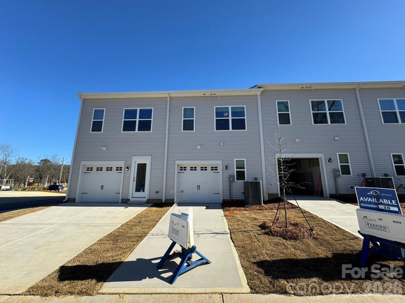 Rear Exterior with Garage Entry