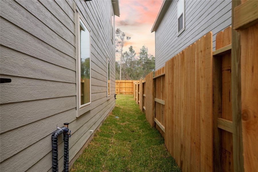 Exterior details and patio area of a home in Tavola, New Caney (Image 3).