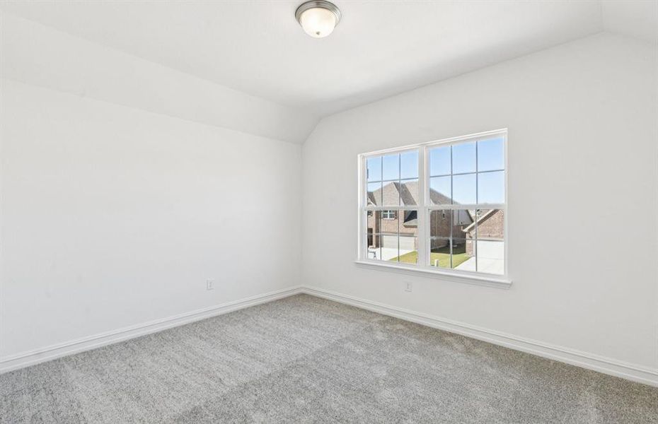 Spacious secondary bedroom with large windows Spacious secondary bedroom with large windows