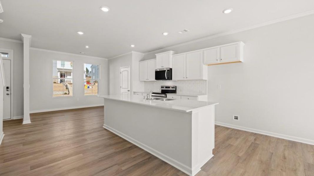 Furnished interior view inside a new home in Waypoint, Flowery Branch (Image 7).