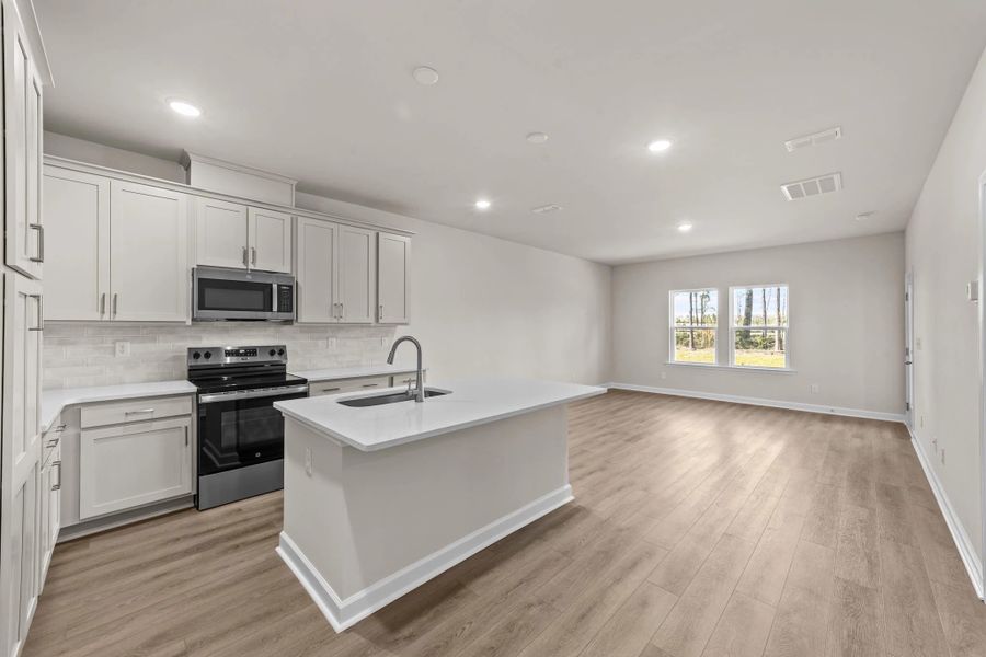 Furnished interior view inside a new home in Blue Heron Retreat, Little River (Image 5).