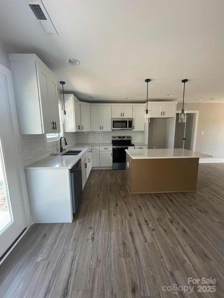 Furnished interior view inside a new home in , Lawndale (Image 4).