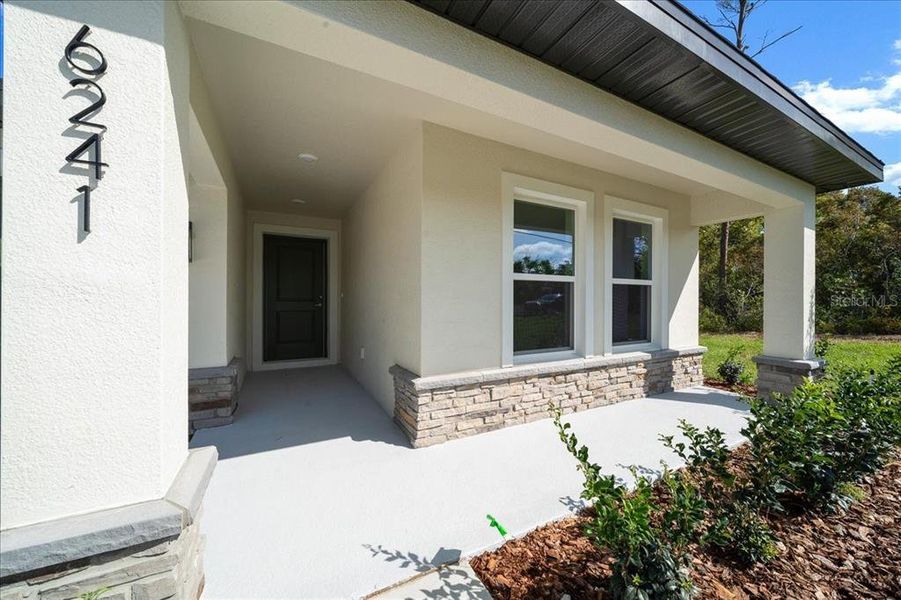 Exterior details and patio area of a home in , Spring Hill (Image 4). Exterior details and patio area of a home in , Spring Hill (Image 4).
