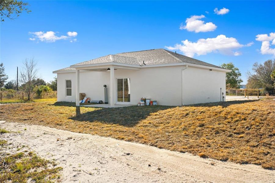 Exterior details and patio area of a home in , Okeechobee (Image 27).