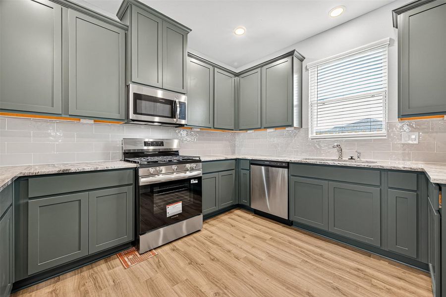 Furnished interior view inside a new home in Sunterra, Katy (Image 14).