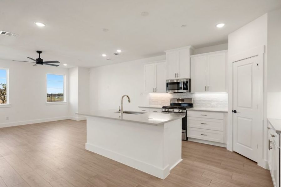 Furnished interior view inside a new home in Mosaic, Prosper (Image 4).